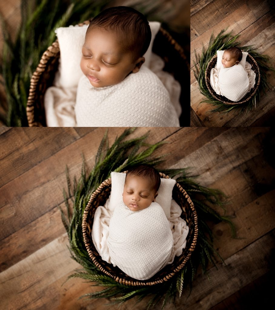 Rustic photos with baby in a basket surrounded by garland in studio 